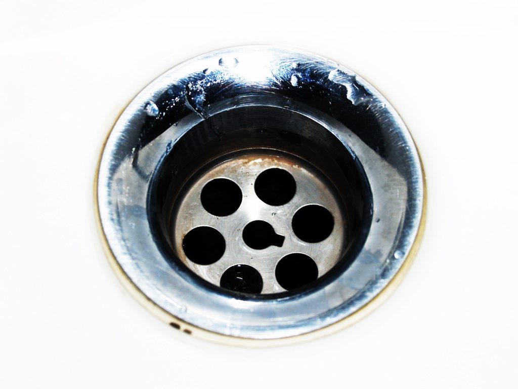 Bouchon de siphon métallique avec gouttes d'eau